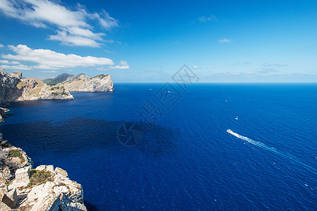 西班牙马洛卡的海岸附近假期海洋侵蚀旅游导师岩石海岸线蓝色旅行太阳图片