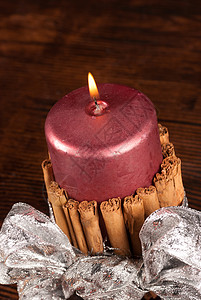 魔法蜡烛烛光燃烧肉桂装饰品手工丝带家常点燃红色静物高清图片