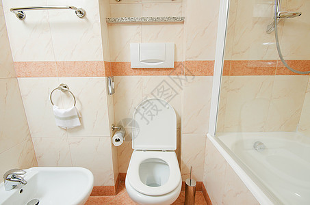 现代洗手间中的厕所龙头民众房间奢华卫生间风格陶瓷房子地面座位图片