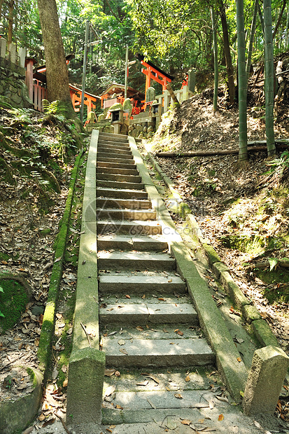 木制门牌坊木头橙子神社宗教红色旅行走廊城市人行道图片