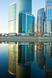 摩天大楼建造民众中心城市金融太阳市中心玻璃天空蓝色图片