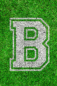 绿草上的英文字母h沥青地面体育场条纹院子操场生长足球场地活力图片