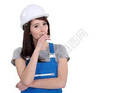 女性体力劳动者学徒工人商品蓝色工作服沉着头盔白色女士图片