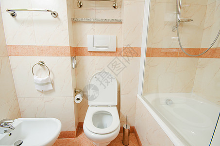 现代洗手间中的厕所收藏浴室座位民众龙头房间卫生地面酒店卫生间图片