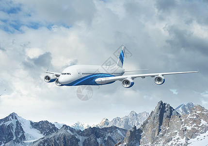 高山上空的白色客机涡轮顶峰喷射土地阳光机身风景地平线航空旅游图片