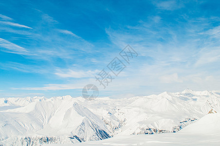 明亮的冬天天雪山冰川山脉旅行顶峰阳光白色滑雪太阳蓝色风景图片