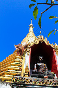 泰国的佛祖蓝色古董身体教会寺庙精神旅游地面宗教金属图片