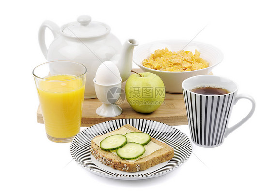 早饭吃得好薄片茶壶橙汁白色活力果汁面包玻璃盘子食物图片