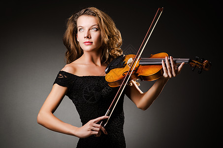 演播室有小提琴的女演员中提琴小提琴家独奏提琴手艺术家乐器女孩演奏家艺术协奏曲图片
