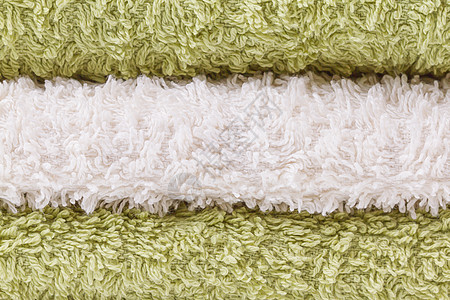 绿毛巾和白毛巾羊毛材料地毯蓝色治疗纤维吸水性回旋酒店温泉图片