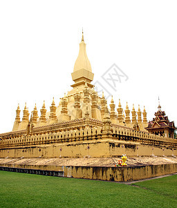 在万象寺庙的金巴达 在老挝旅行寺庙异国万象蓝色文化旅游佛教徒遗产天空祷告图片