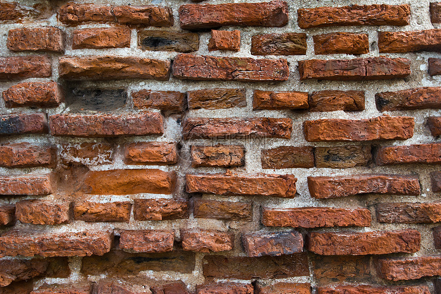 在泰国的旧墙瓦砾石墙平铺城市石匠黏土砖块积木水泥矩形图片