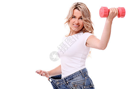 体重减瘦后穿着大裤子的年中妇女快乐身体女性饮食腰部减肥损失衣服女士数字图片