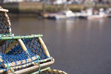 在惠特比码头捕龙虾绳索木头渔民钓鱼港口选择性渔船焦点渔夫陷阱图片