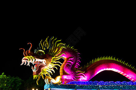 夜里中国风格的龙雕像雕塑信仰宗教动物传统力量蓝色天空文化艺术图片