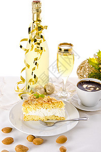 香槟和蛋糕酒精香草蜡烛生日咖啡馅饼饼干瓶子奶油牛奶图片