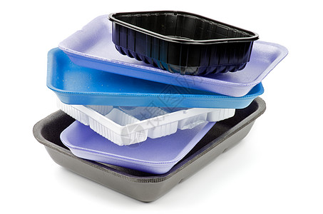 塑料盘子空托盘储物蓝色紫色塑料长方形模压午餐食品餐盘灰色背景