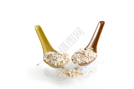 白上隔离勺子的燕麦片片小吃饮食养分谷物麦片食物营养稀饭薄片木头图片
