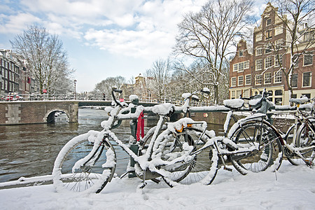 荷兰阿姆斯特丹市的雪雪特丹自行车建筑学运输建筑房子风光城市图片