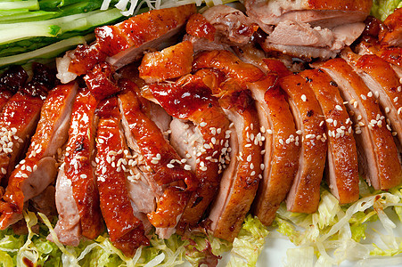 烤鸭 中式鸭子红色烹饪皮肤家禽香料炙烤主菜洋葱菜肴图片
