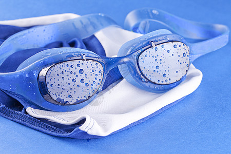 游泳护目镜游泳衣风镜游泳者眼镜乐趣竞赛运动活动橡皮海滩图片