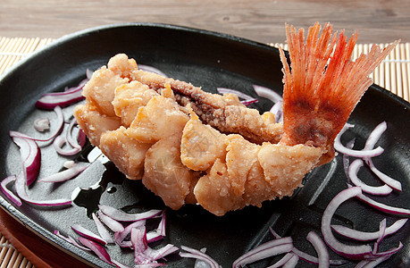 燃烧的岩石鱼烹饪石斑鱼筷子淀粉饮食蔬菜传统美食盘子食物图片