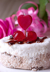配樱桃的喜庆蛋糕花束蛋糕架糖艺奢华磨砂杯子派对口香糖椰子花瓣图片