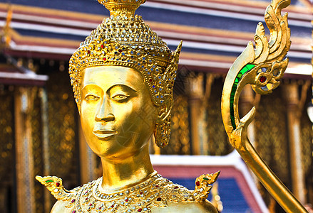 在泰国曼谷大宫殿的金色骨架雕像金子历史寺庙装饰品旅游异国情调女士艺术宗教图片