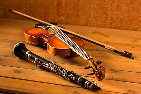古老木柴中的经典音乐小提琴和单簧管音乐会低音旋律古董音乐家木管独奏细绳风格交响乐图片