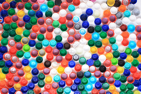 塑料背景绿色马赛克宠物彩虹瓶子垃圾胶囊白色回收饮料背景图片