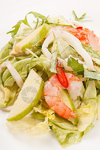 沙拉加卡拉马里沙拉和虾沙拉蔬菜柠檬盘子烹饪午餐餐厅国王贝类鱿鱼图片