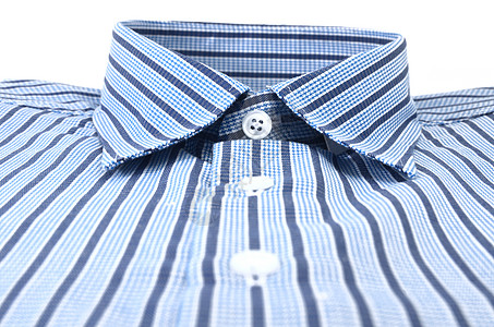 蓝男子衬衫衣服服装标签设备按钮衣领物体纽扣时尚折叠背景图片