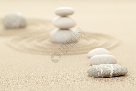 沙中平衡的石块精神岩石专注卵石生活灵魂圆形石头传统场景图片