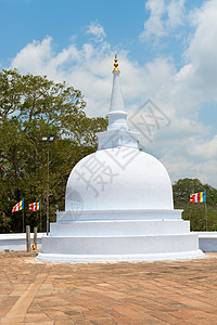 斯里兰卡的小白小丘帕宝塔历史艺术石头佛教徒蓝色宗教旅行寺庙雕塑图片