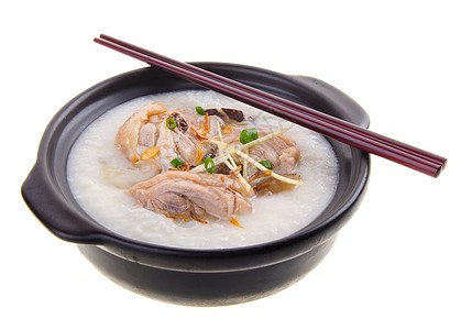 泥锅里用过传统的中国粥粥水稻汁午餐文化猪肉餐厅稀饭食物蔬菜早餐水平图片