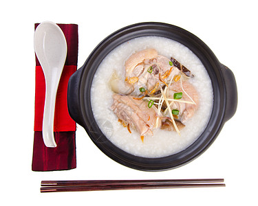 泥锅里用过传统的中国粥粥水稻汁餐厅午餐水平蔬菜文化稀饭猪肉食物早餐图片