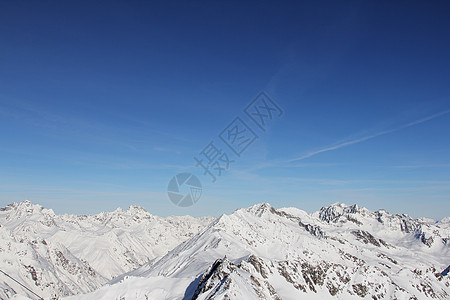 冬季山区假期运动阳光风景全景顶峰单板环境旅行天空图片