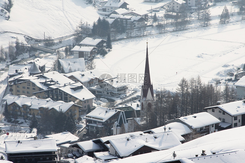 奥地利冬季索尔登的全景滑雪建筑物村庄假期教会房子建筑学街道森林天气图片