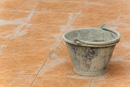 塑料桶染色安装陶瓷工人打扫水泥洗手间材料水平住宅背景图片