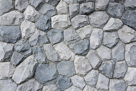 石墙鹅卵石建造建筑灰色石头大理石人行道街道绿色地面图片