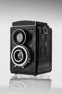 胶卷胶卷胶卷的老式双镜头照相机背景图片