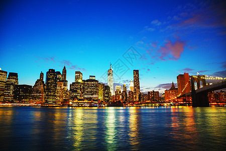 日落时纽约市市风景天空办公室建筑学市中心建筑景观全景反射摩天大楼码头图片