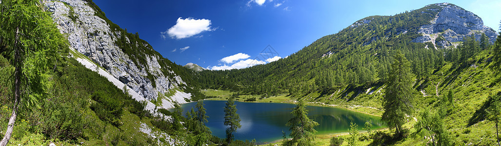 山岳中的湖泊天空环境太阳冰川高山顶峰荒野旅游风景蓝色图片