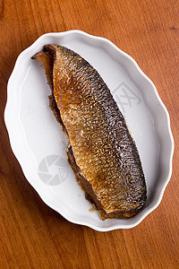 烟熏小吃盐渍美食盘子美味鱼片盐水营养鲱鱼白色图片