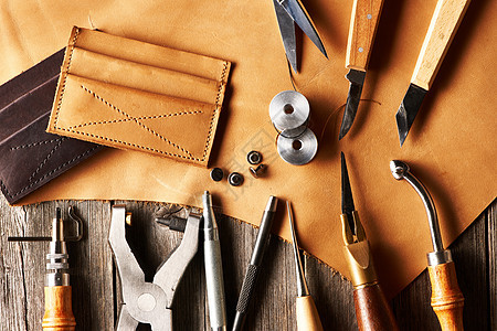 皮革工艺工具产品店铺桌子隐藏工作锥子商业做工前锋手工图片