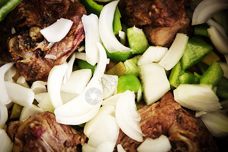 混合蔬菜的羊肉炖菜营养草药金属羊肉晚餐勺子钢包食物土豆烹饪图片