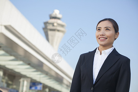 旅行者看机场的天空航班收腰头发游客运输商务奢华希望棕色机动性图片