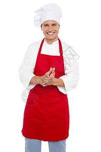 穿着适当制服的男性有自信和自信的男厨师工作商业餐厅食谱食物厨房面包师快乐服务手势图片
