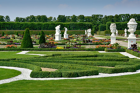 德国汉诺威的花园中带有雕塑的花园大理石庄园花坛叶子树叶文化园艺建筑学旅行娱乐图片
