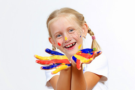 手上涂着油漆的幸福的孩子艺术家喜悦画家艺术品教育女孩童年指纹艺术手指图片